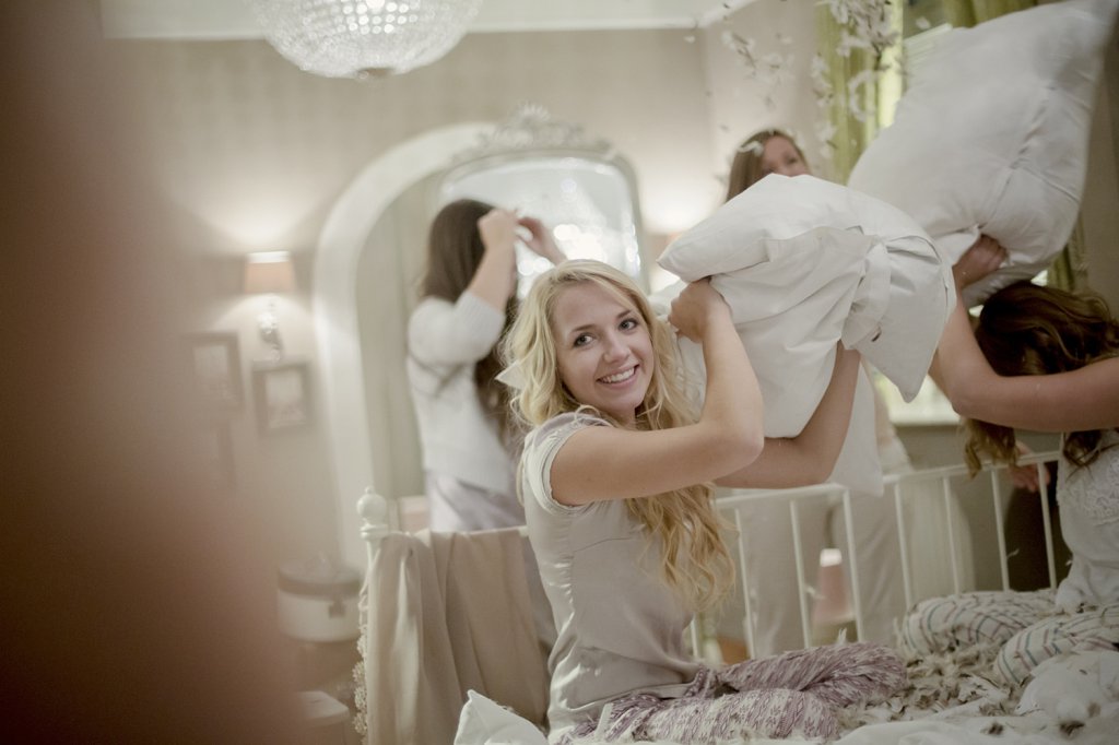 Photo Pillow fight at the bridal shower